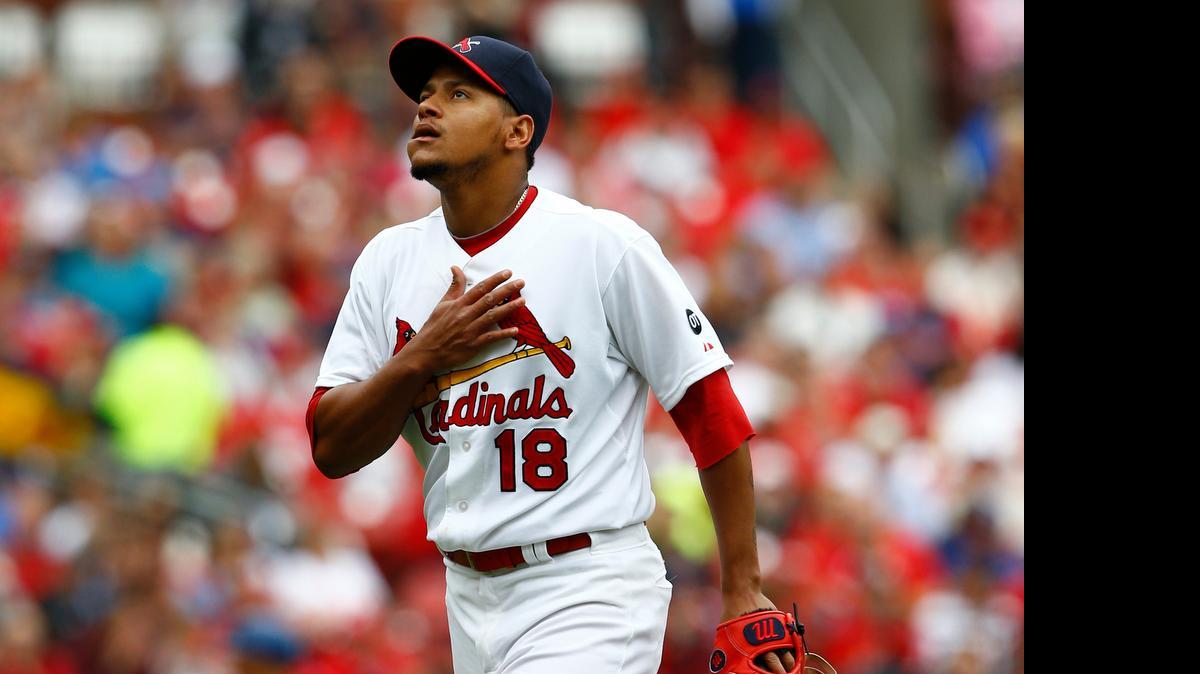 
Cardinals pitcher Carlos Martinez reacts after striking out the Dodgers' Alex Guerrero to end the seventh inning Sunday at Busch Stadium. Martinez pitched seven scoreless innings to help lead the Cardinals to a 3-1 victory.
