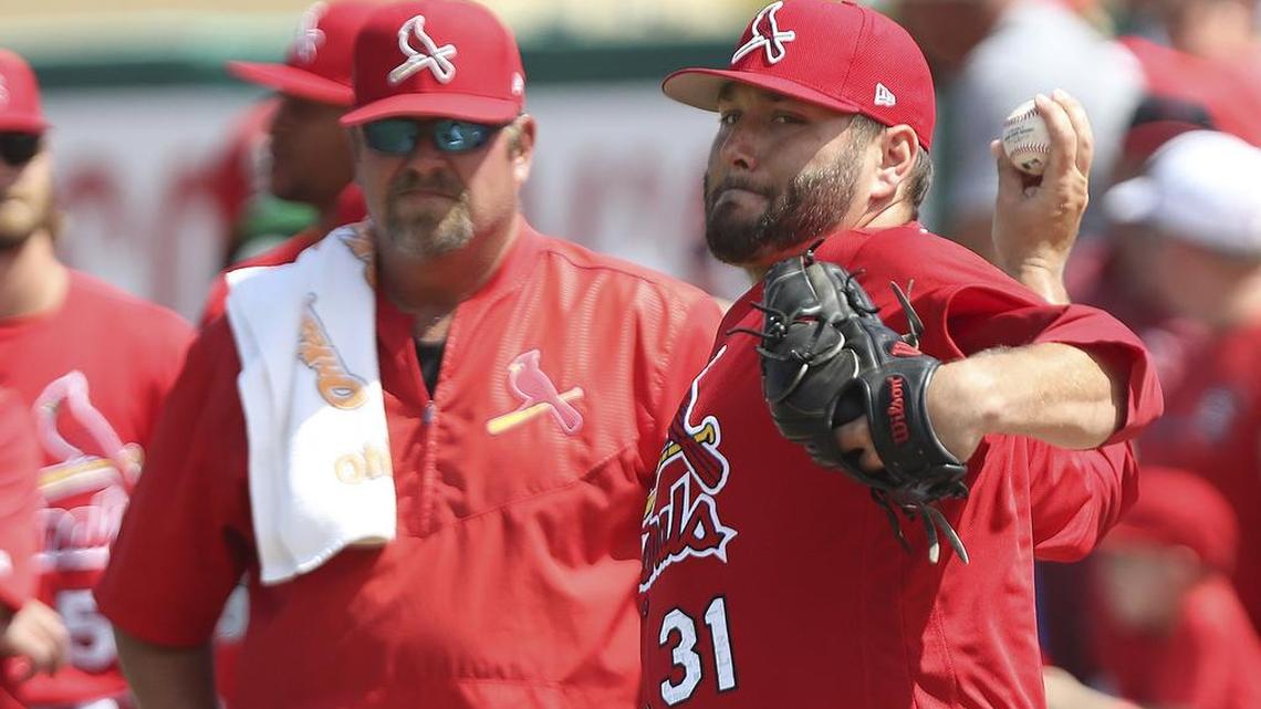 St. Louis Cardinals pitcher Lance Lynn warms up for the spring training game against the Houston Astros.