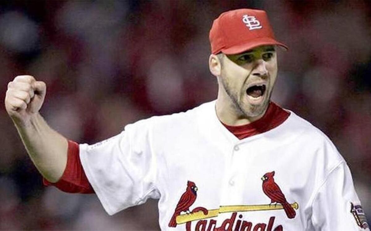 The fiery Chris Carpenter was inducted into the St. Louis Cardinals Hall of Fame Saturday, along with Joe Torre, Terry Moore and Sam Breadon.