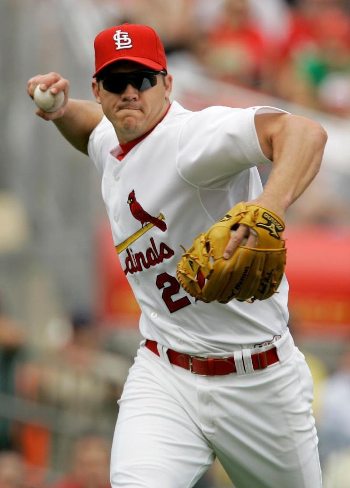 Scott Rolen throws to first during a spring training baseball game against the Baltimore Orioles Wednesday, March 21, 2007 in Jupiter, Fla.