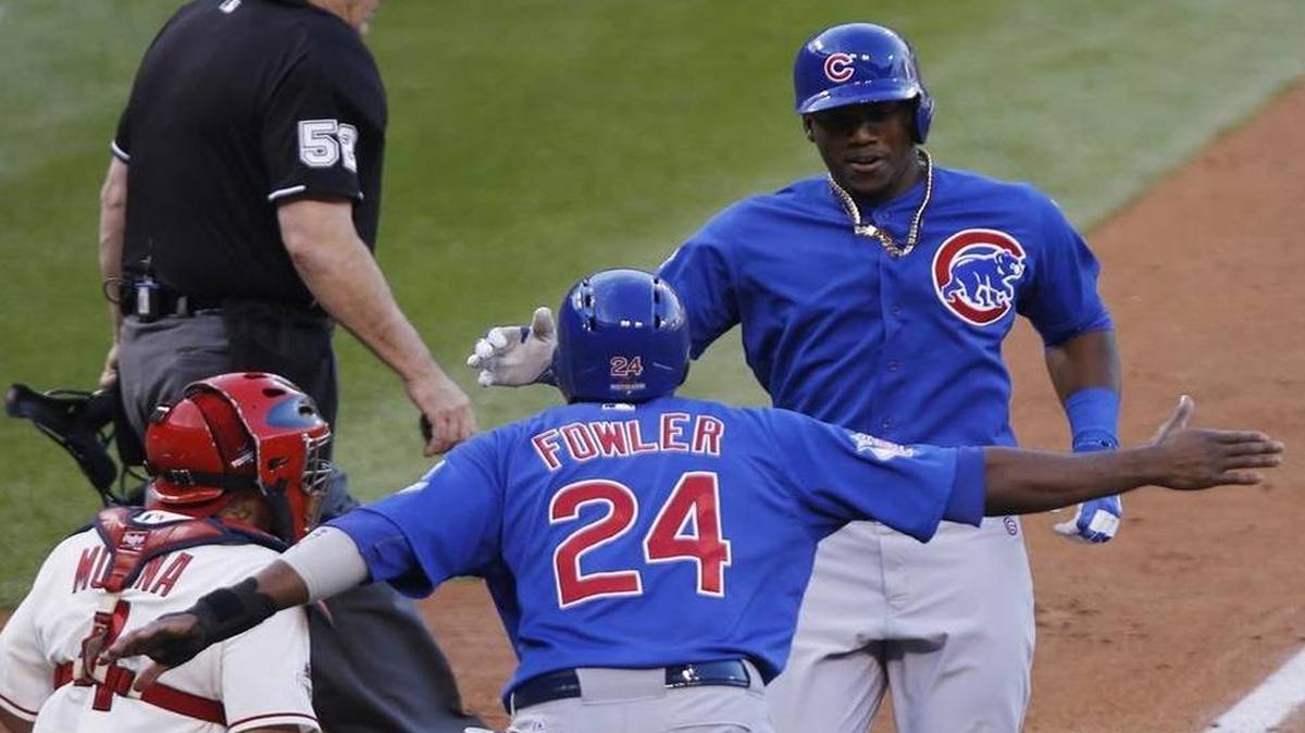 Who wants to see this scene repeated? The Cubs’ Dexter Fowler and Jorge Soler celebrate during their win over St. Louis (and catcher Yadier Molina) in Game 2 of the National League Division Series last October.