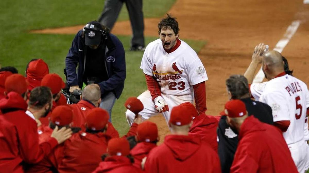 David Freese arrives at home plate after hitting his game-winning home run in the 11th inning of Game 6 of the 2011 World Series. The St. Louis Cardinals defeated the Texas Rangers 7-6 that night – Oct. 27, 2011 – and won the Series with a 6-2 victory in Game 7 the next night.