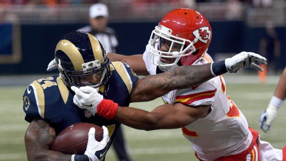 The Kansas City Chiefs’ Marcus Cooper brings down then-St. Louis Rams running back Isaiah Pead by his facemask during a game in 2015 when the Rams still called St. Louis home. They moved back to Los Angeles following that season and, along with the Chiefs, were one of the teams listed in the BND’s latest poll on whether you still root for a team in the NFL.