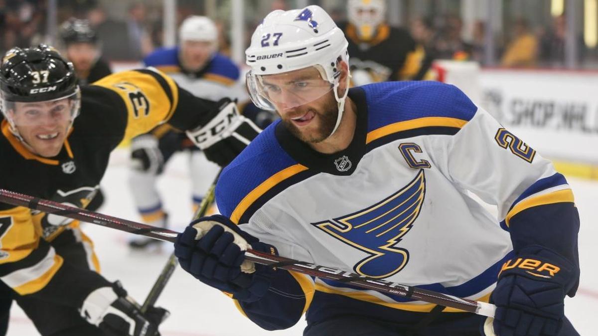 St. Louis Blues’ Alex Pietrangelo looks for the puck along the boards as Pittsburgh Penguins’ Carter Rowney (37) defends during the second period of the NHL preseason hockey game on Sunday, Sept. 24, 2017, in Cranberry, Pa.