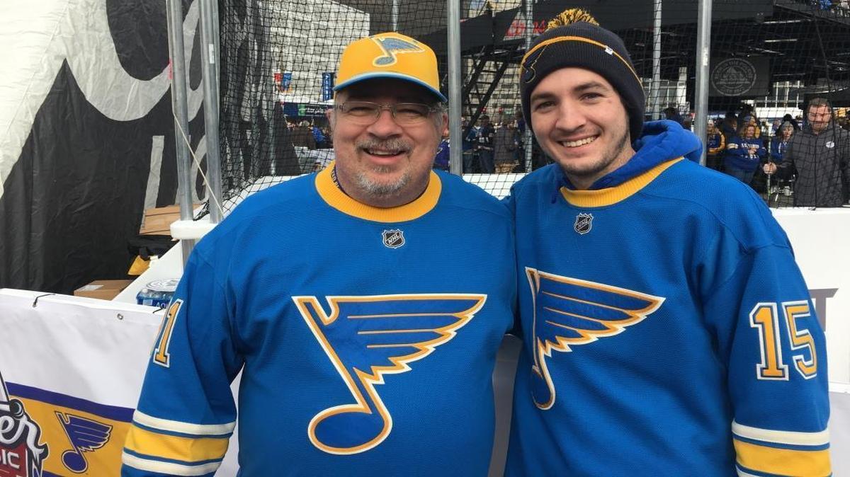 Belleville residents Tim Simpson (left) and son Mitch Simpson sporting their St. Louis Blues Winter Classic jerseys on Saturday outside Busch Stadium before the Blues-Blackhawks Winter Classic Alumni Game.