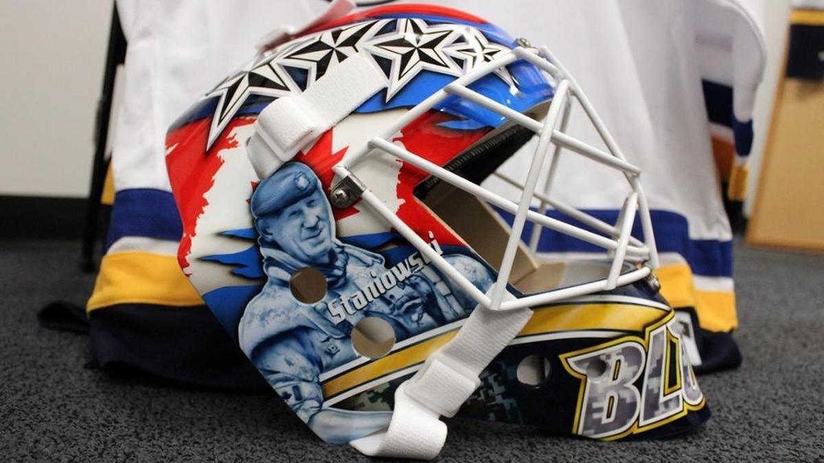 St. Louis Blues goalie Jake Allen’s special Veterans Day mask includes the likeness of Ed Staniowski, a former NHL player who served deployments in the Middle East with the Canadian Armed Forces.
