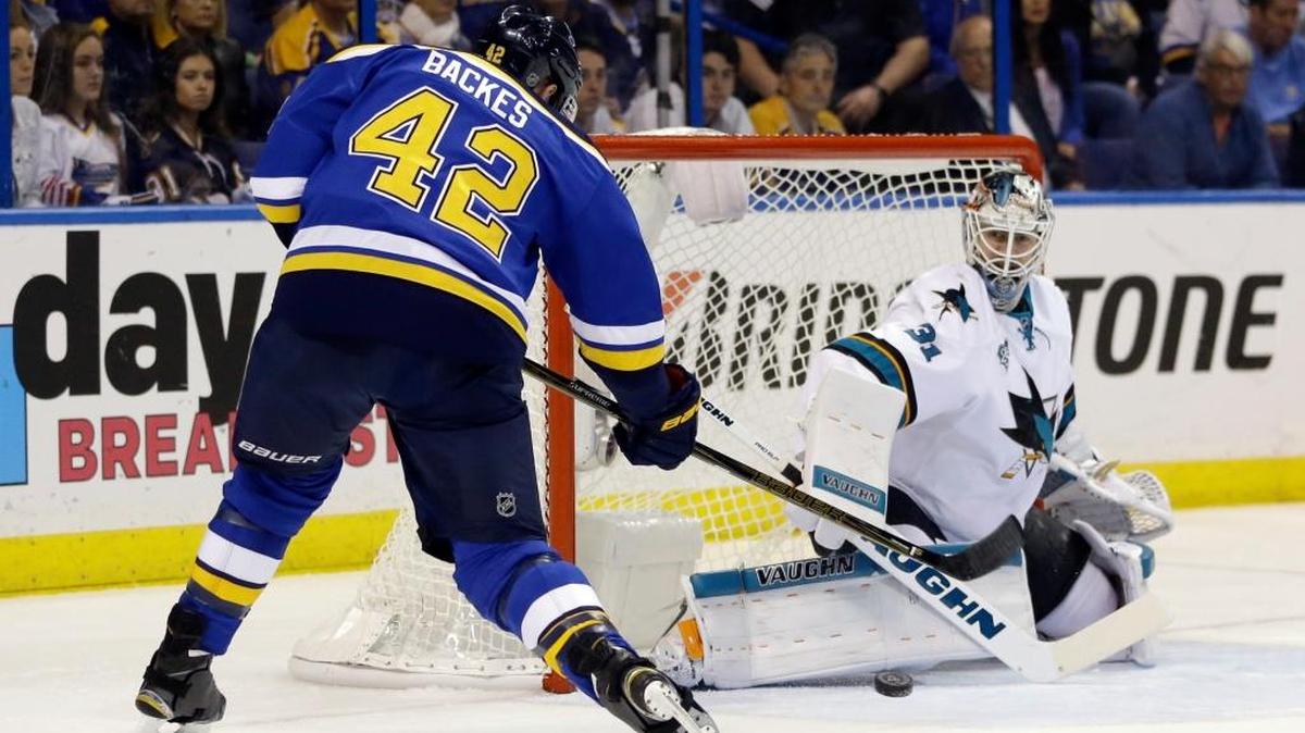 San Jose Sharks goalie Martin Jones (31) blocks a shot by St. Louis Blues center David Backes (42) during the second period in Game 5 on Monday.
