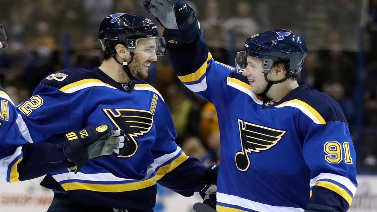 St. Louis Blues defenseman Kevin Shattenkirk, left, is congratulated by Vladimir Tarasenko, of Russia, after scoring during the second period Thursday against the Tampa Bay Lightning. (AP Photo/Jeff Roberson)
