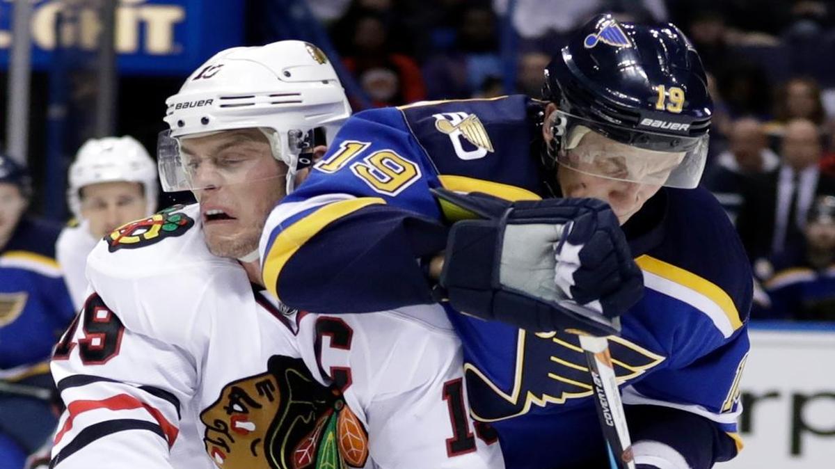 Chicago Blackhawks' Jonathan Toews, left, collides with St. Louis Blues' Jay Bouwmeester during the second period of an NHL hockey game Wednesday, Nov. 9, 2016, in St. Louis.