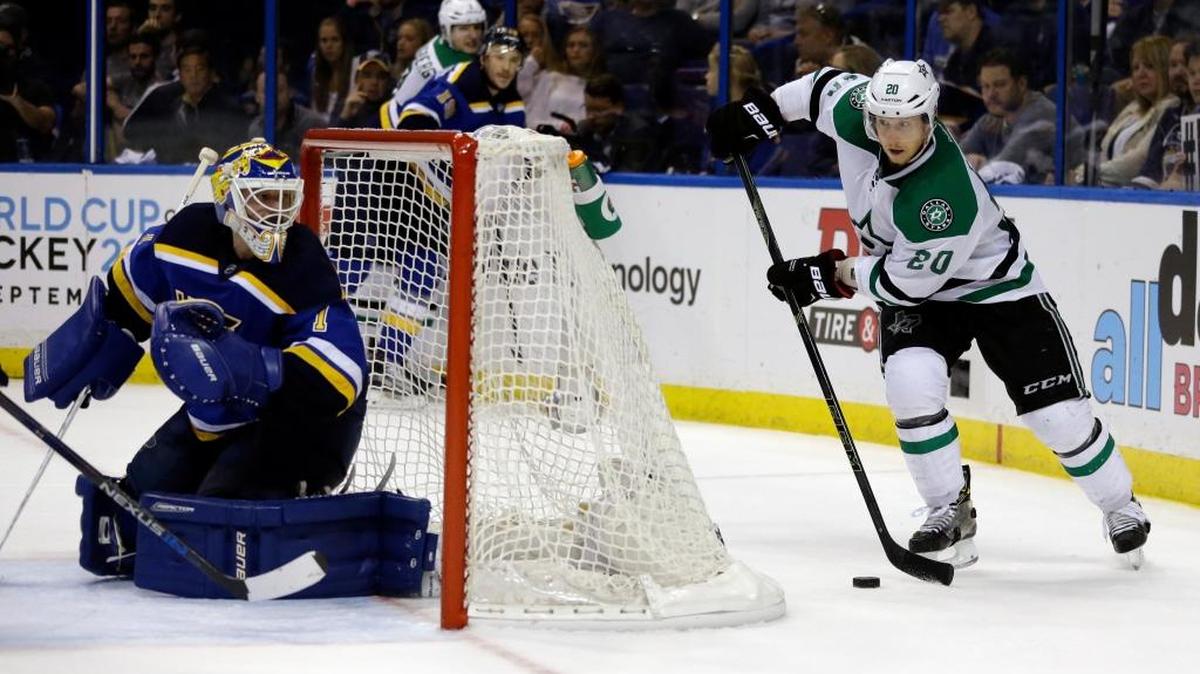Dallas Stars’ Cody Eakin, right, looks to pass as St. Louis Blues goalie Brian Elliott defends during the third period of Game 4 Thursday at Scottrade Center.