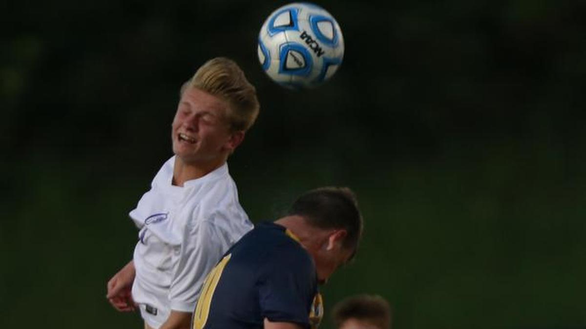 Collinsville’s Logan Whitehead and O’Fallon’s Blake Stroh go for a header during their game at Collinsville in 2016.