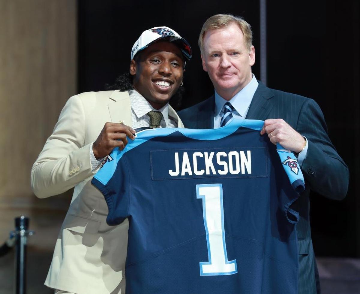 Adoree' Jackson, left, poses with NFL commissioner Roger Goodell after being selected by the Tennessee Titans during the first round of the 2017 NFL football draft, Thursday, April 27, 2017, in Philadelphia.